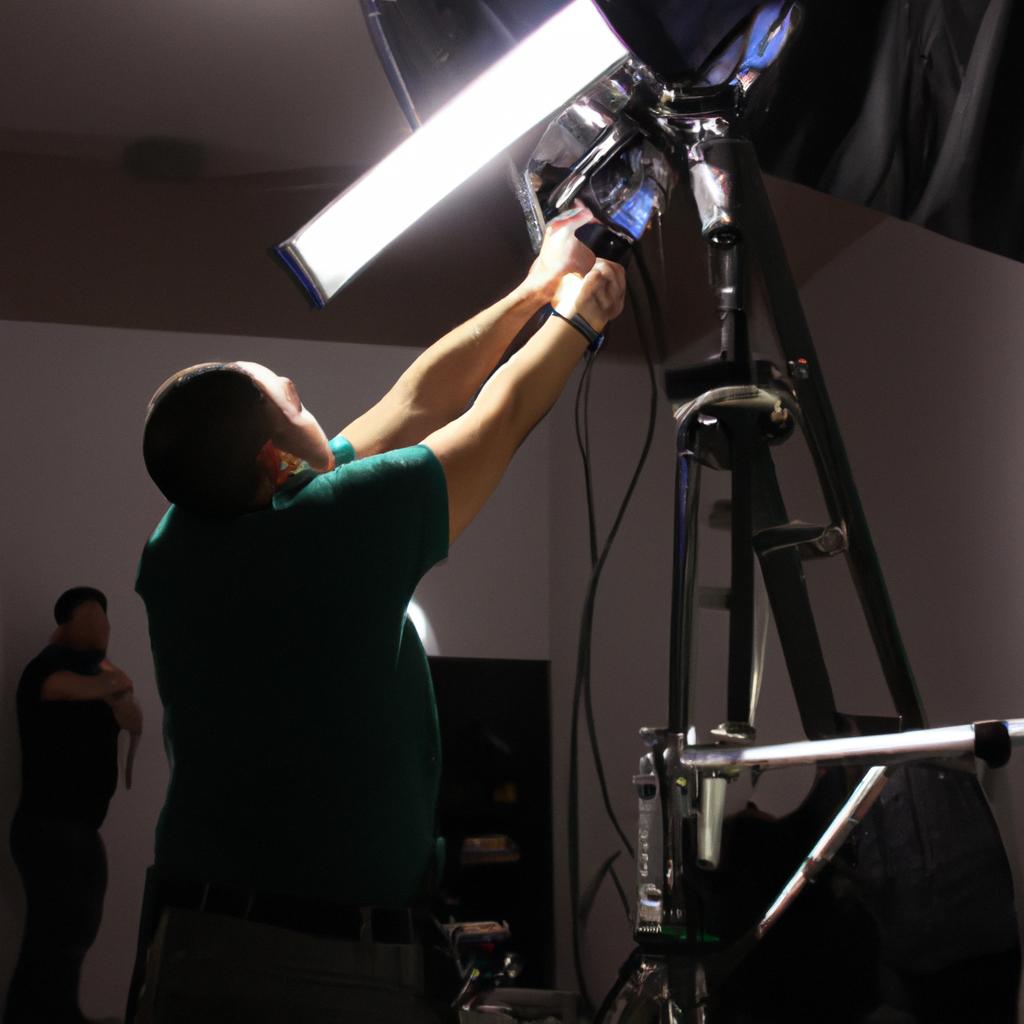 Person operating lighting equipment backstage